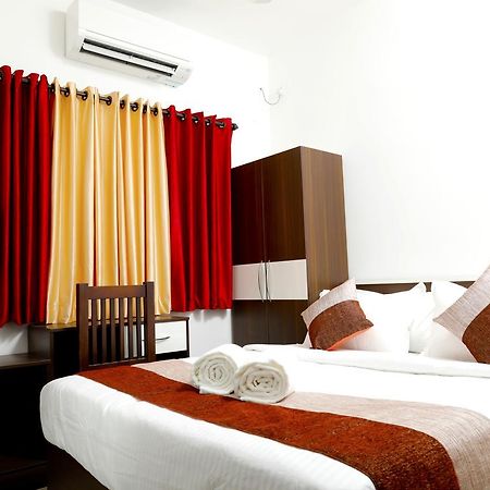 Puthens Clifton Inn Kottayam Buitenkant foto