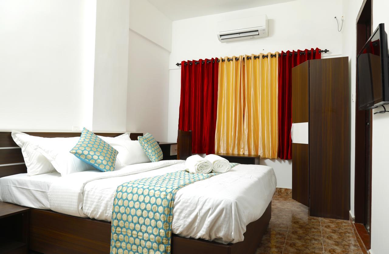 Puthens Clifton Inn Kottayam Buitenkant foto