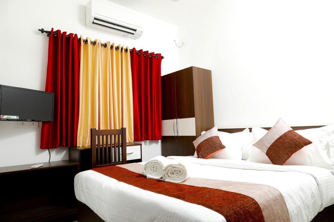 Puthens Clifton Inn Kottayam Buitenkant foto