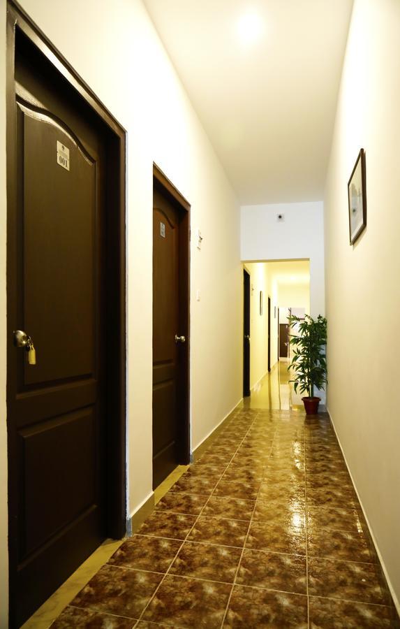 Puthens Clifton Inn Kottayam Buitenkant foto